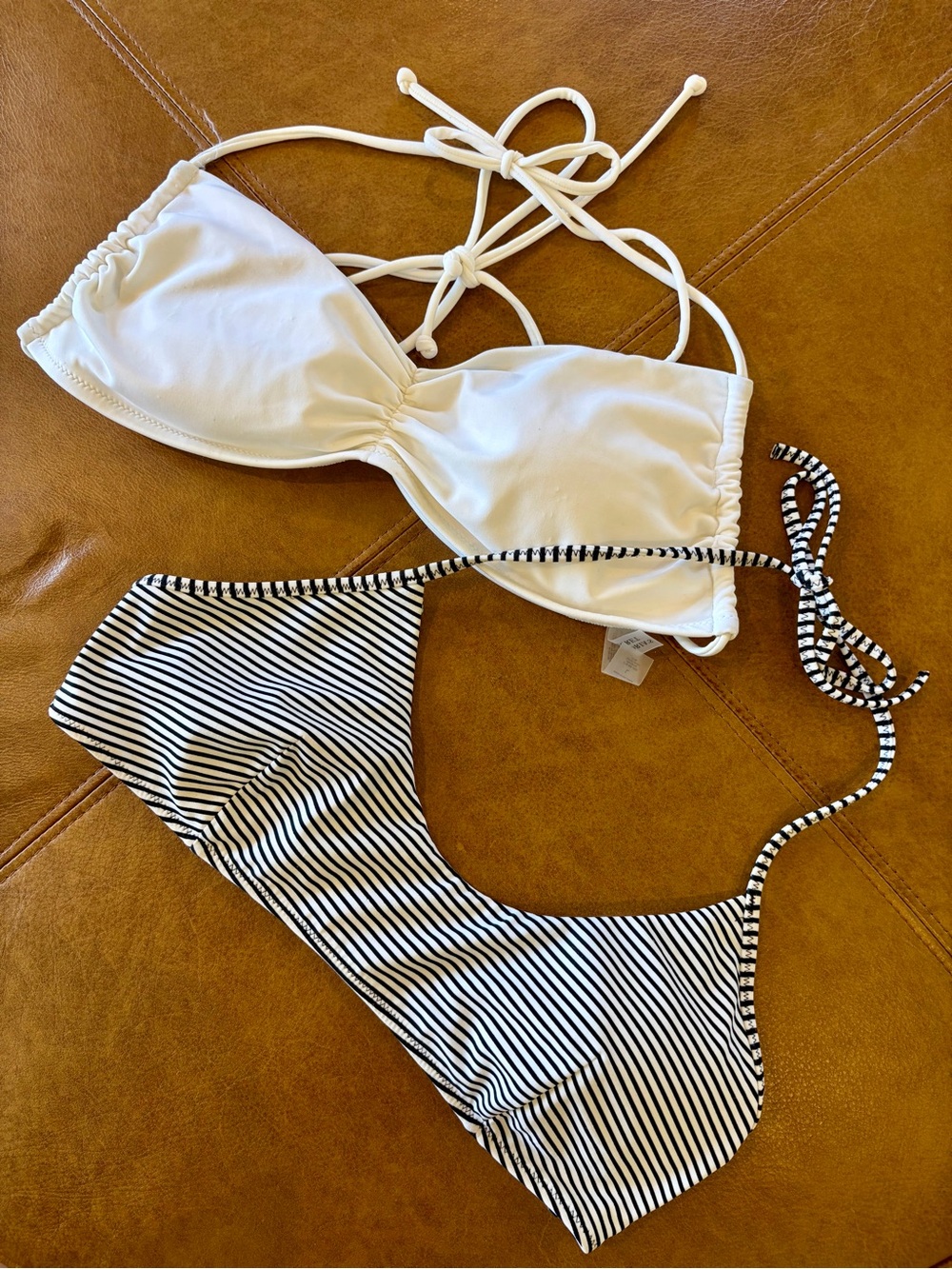 Victoria’s Secret Bikini Tops Bundle
Size L White Bandeau & Black White Swim Top